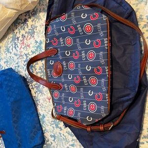 Authentic Dooney and Bourke Chicago Cubs shoulder bag. Excellent condition.